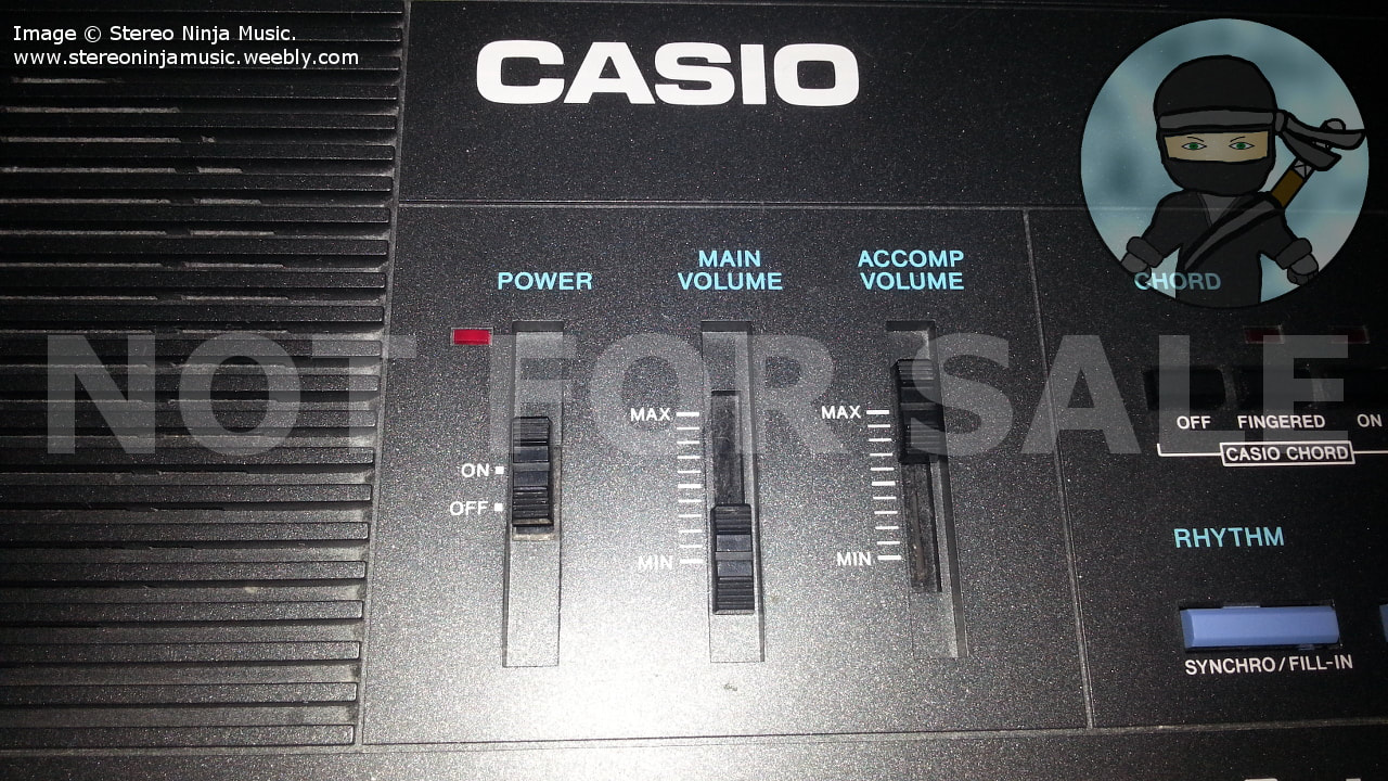 An image showing the Power switch, Main Volume and Auto Accompaniment Volume controls